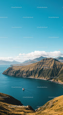 Majestic Mountain Range Over Serene Coastal Lake with Boat