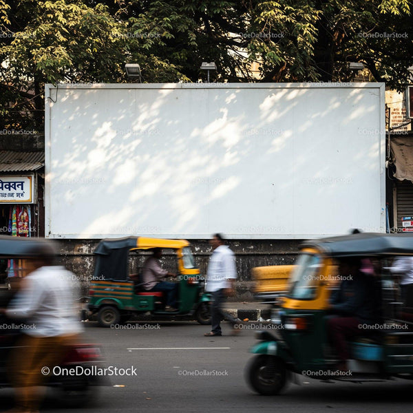Busy street with auto rickshaws and pedestrians in motion JPG Mockup Image
