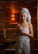 Relaxing Woman in Sauna Wrapped in Towel with Towel Turban in Wellness Center
