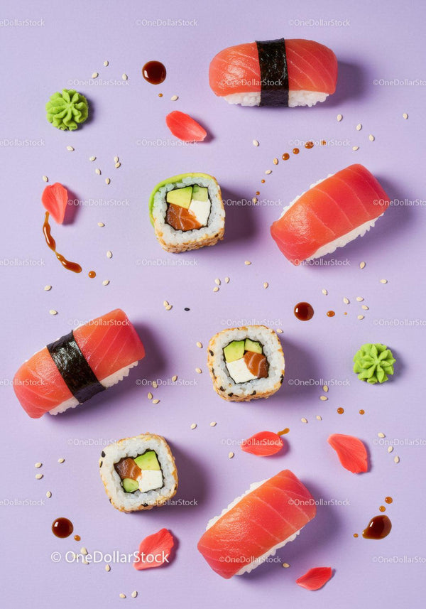 Assorted fresh sushi with wasabi and soy sauce drops