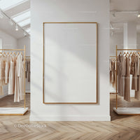 Minimalist clothing boutique interior with blank frame