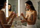 Young Woman Applying Skincare in Bathroom