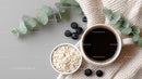 Coffee Mug with Oatmeal and Blueberries on Cozy Breakfast Table