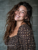 Smiling Woman with Wavy Hair and Elegant Dress in a Studio
