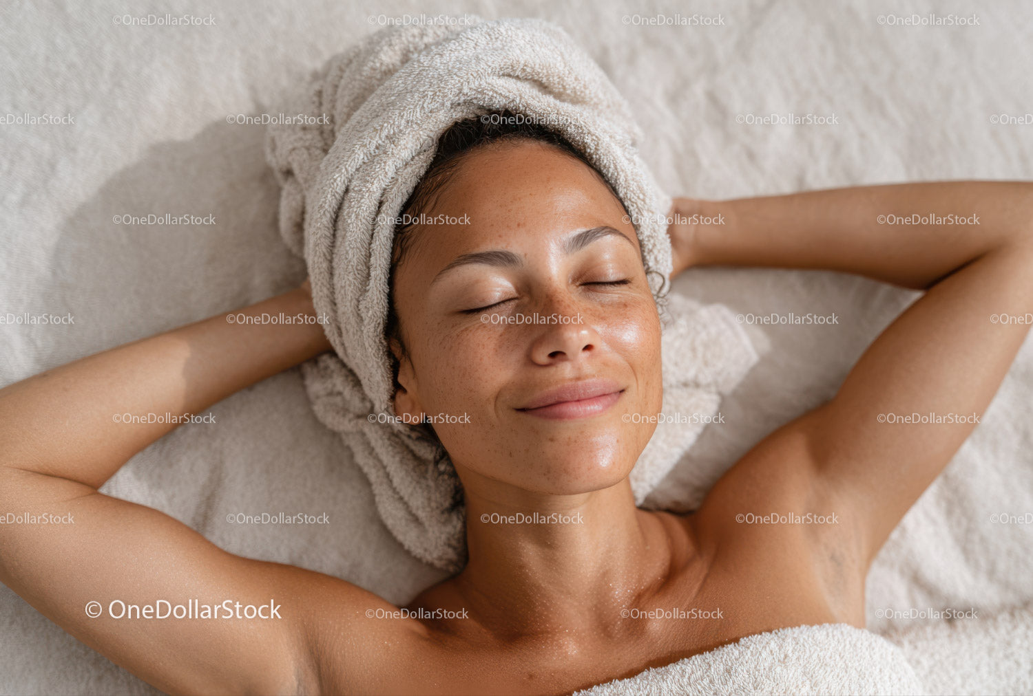 Relaxed Woman with Towel Wrap Enjoying Spa Day