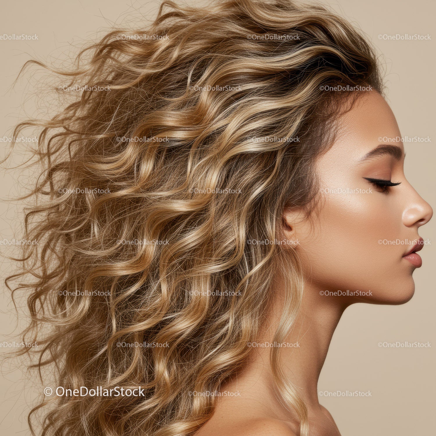 Profile of young woman with voluminous curly blonde hair
