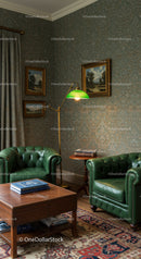 Classic green leather armchairs in vintage reading nook
