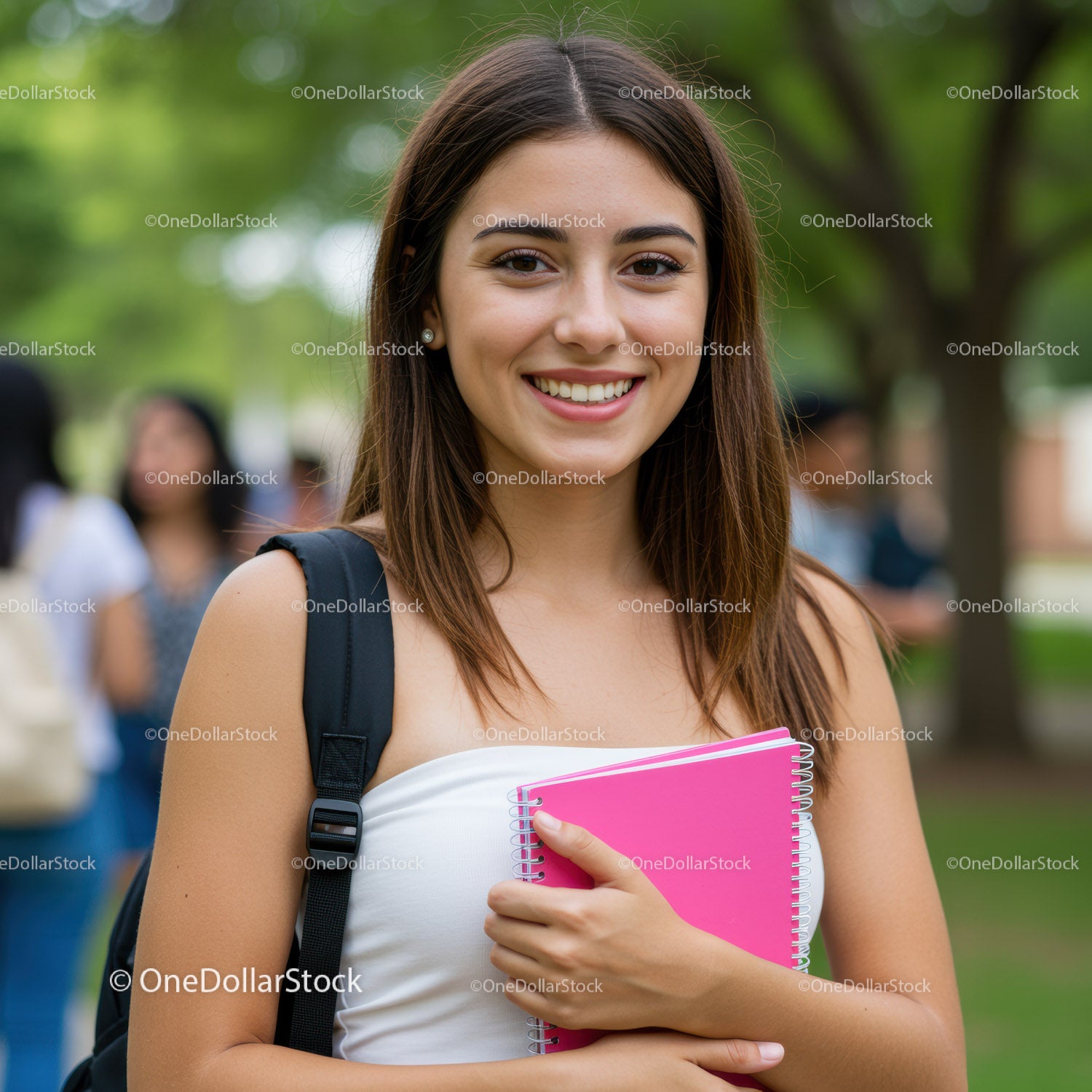 Smiling Young Woman with Backpack and Pink Notebook in Park