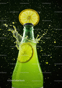 Lemon slice splash on green soda bottle neck