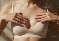 Close-Up of Woman Applying Body Oil to Youthful Skin in Sunshine