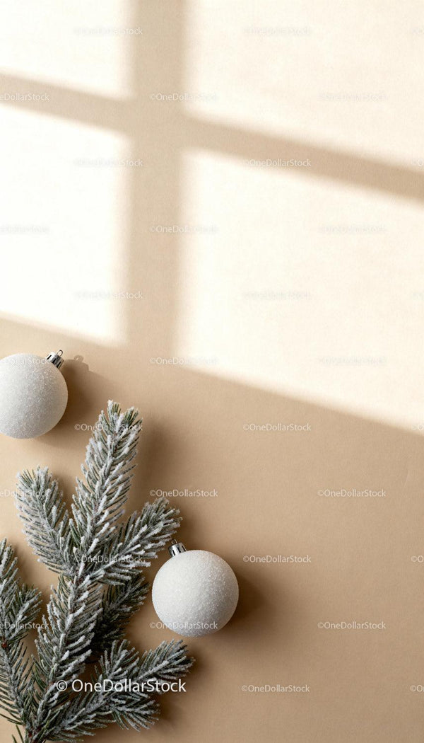Frosted Pine Branch with White Christmas Ornaments