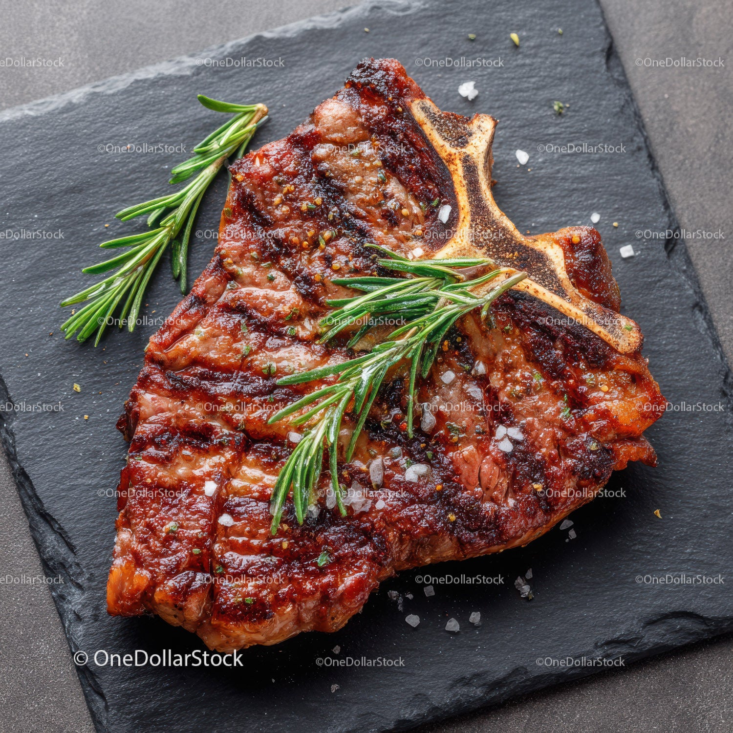 Juicy Grilled Beef Steak with Fresh Rosemary and Seasoning