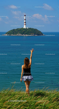 Woman Waving Toward a Lighthouse on an Isolated Island Scene