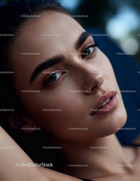 Close up portrait of young woman with natural skin
