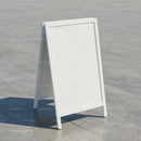 Blank white A-frame sidewalk sign on concrete surface