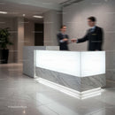 Modern marble reception desk with professional staff