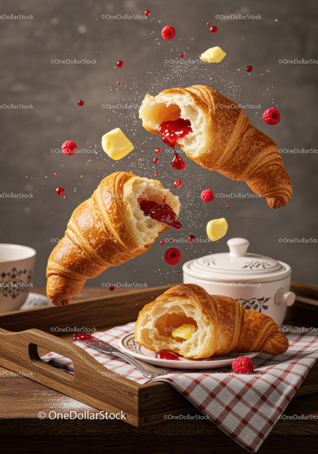 Fresh Croissants with Butter and Raspberry Jam on Tray