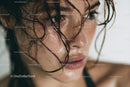 Close-up of Freckled Woman with Wet Hair and Moist Skin