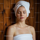 Relaxed Woman with Towel After Spa Treatment in Cozy Wellness Center