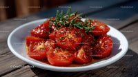 Juicy Fresh Sliced Tomatoes with Herb Garnish on Wooden Table
