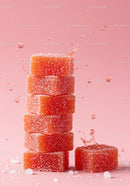 Stack of orange sugar jelly candies with water splash