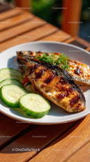 Grilled Fish with Cucumber Slices in Fresh Outdoor Setting