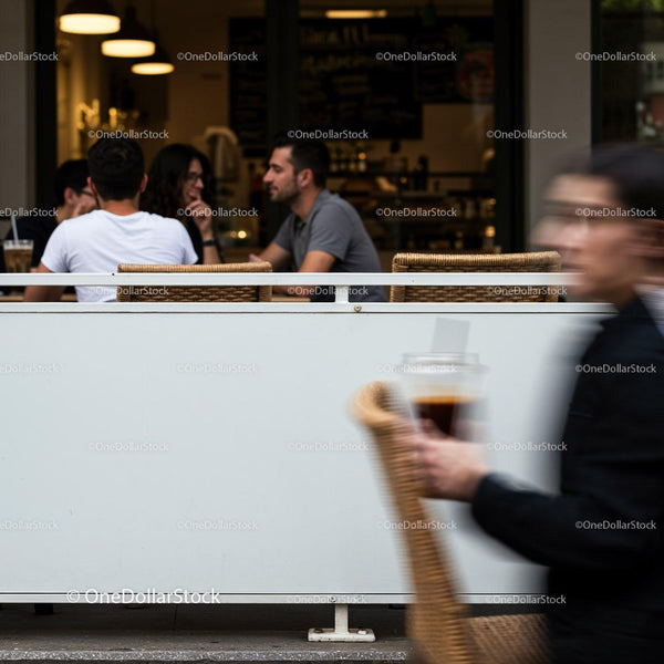 Friends enjoying coffee at an outdoor cafe on a casual day JPG Mockup Image