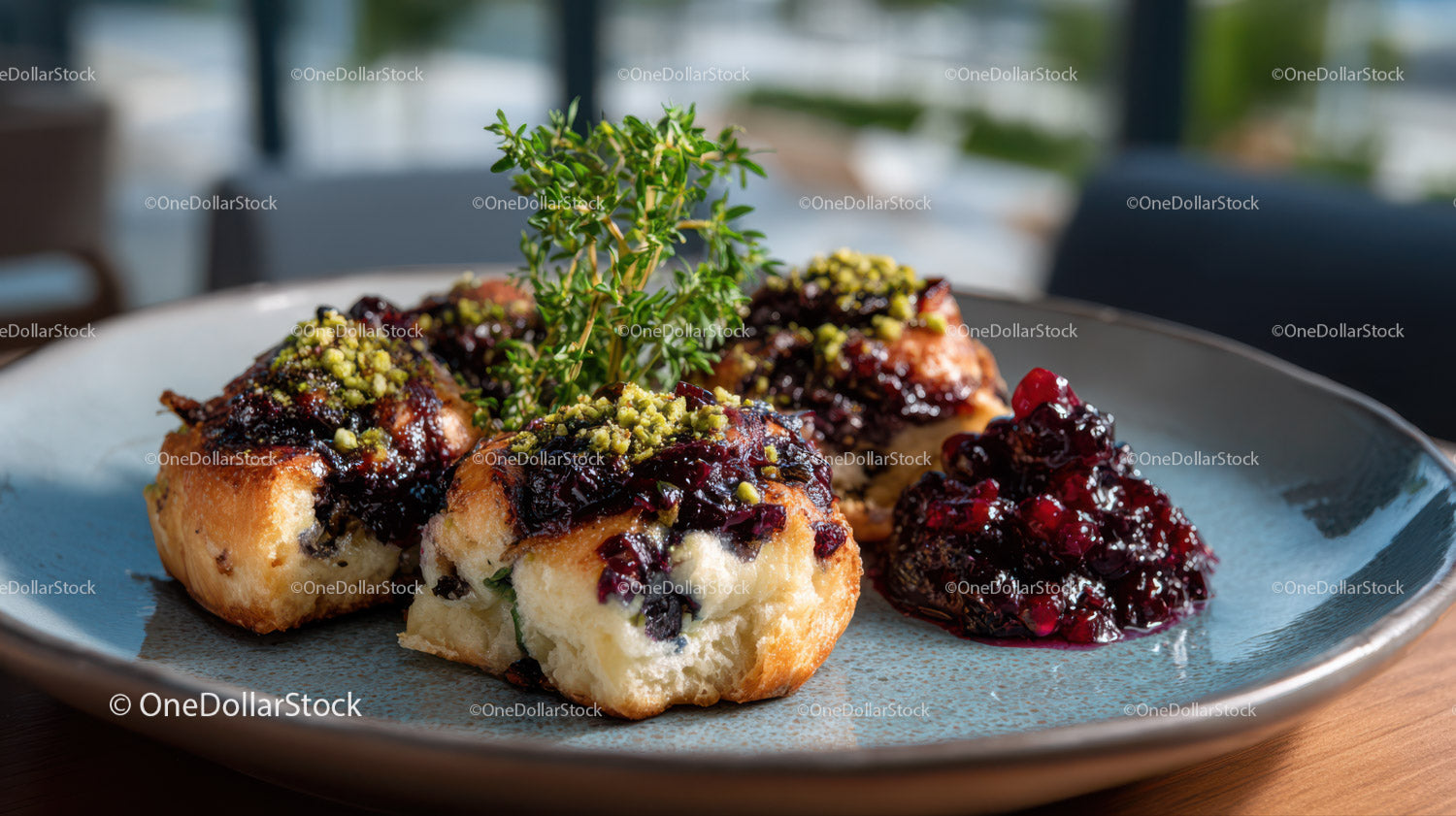 Delicious Blueberry Ricotta Pastries with Berry Compote and Fresh Herbs
