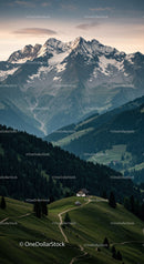 Majestic Snow-Capped Mountain Range with Lush Green Hills and Scenic Paths