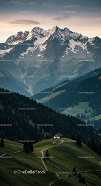 Majestic Snow-Capped Mountain Range with Lush Green Hills and Scenic Paths