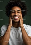 Young Man with Curly Hair and Bright Smile Portrait