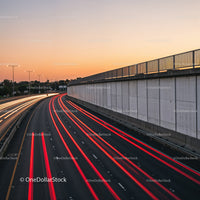 Long Exposure Highway Light Trails at Sunset Overpass