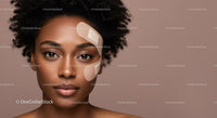 African American Woman with Facial Bandages in Beauty and Skincare Setting