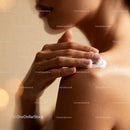 Woman applying moisturizer on smooth shoulder skin