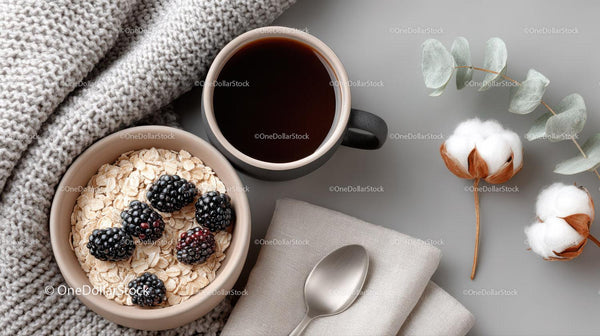 Healthy Breakfast with Oatmeal Blackberries and Coffee on Gray Surface
