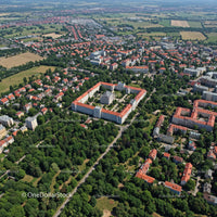 Aerial View of Historic University Campus Surrounded by Greenery