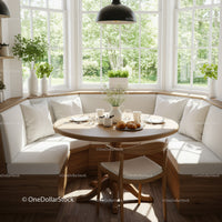 Cozy breakfast nook with natural light and greenery
