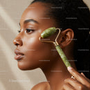 Woman Using Jade Roller for Facial Massage in Spa Setting