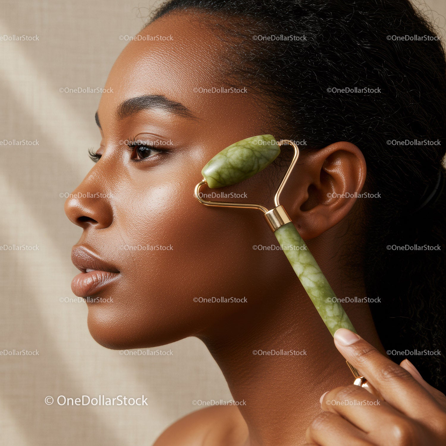 Woman Using Jade Roller for Facial Massage in Spa Setting