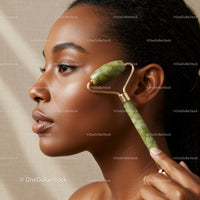 Woman Using Jade Roller for Facial Massage in Spa Setting