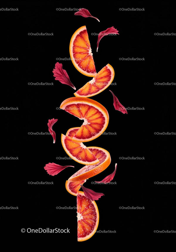 Fresh Blood Orange Slices with Red Flower Petals on Black