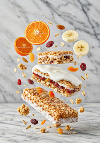 Healthy granola bars with yogurt and fresh fruit slices