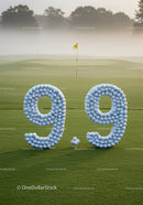 Golf Balls Forming Number 9.9 on Green Course