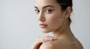 Elegant Female Portrait with Glowing Skin and Calm Expression