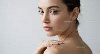 Elegant Female Portrait with Glowing Skin and Calm Expression