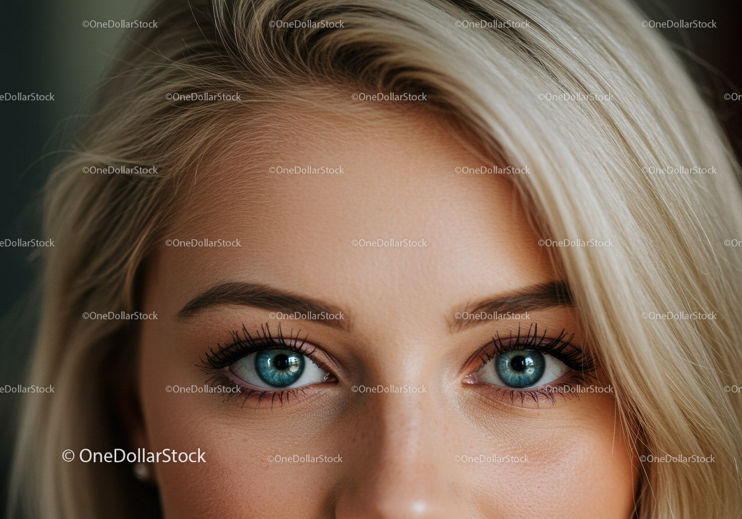 Close up of blue eyes and blonde hair detail