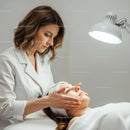 Relaxing Facial Treatment Scene with Skincare Professional and Woman