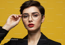 Woman with Short Hair and Round Glasses in Fashionable Portrait