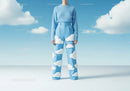 Surreal Fashion Outfit with Cloud Design Blue Pants and Sweater