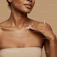 Close-Up of a Woman Applying Moisturizer for Healthy Skin
